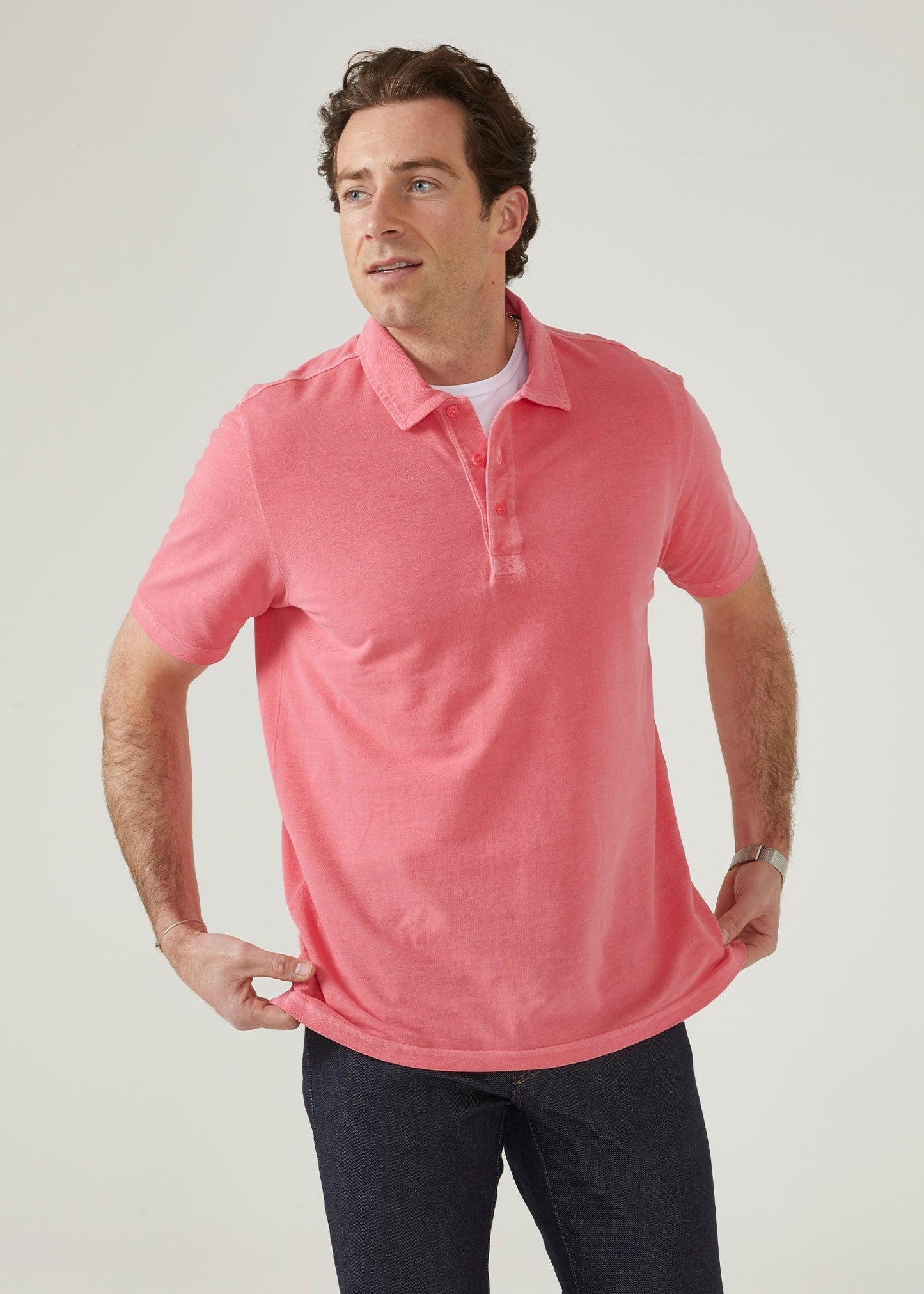 calypso pink polo shirt with short sleeves made from 100% preuvian cotton.